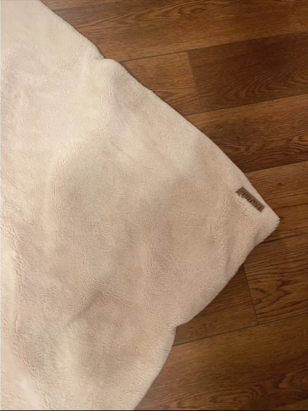 UnHide blanket in cream 60 by 80